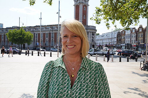 Donna Harris in front of town hall