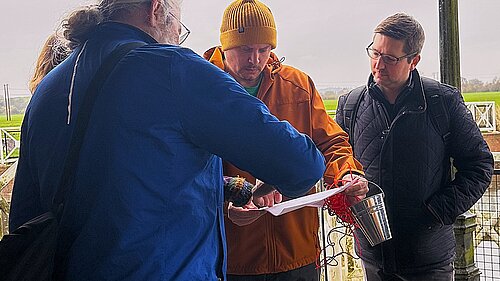 Cameron Thomas and Richard Stanley while testing water on the River Avon