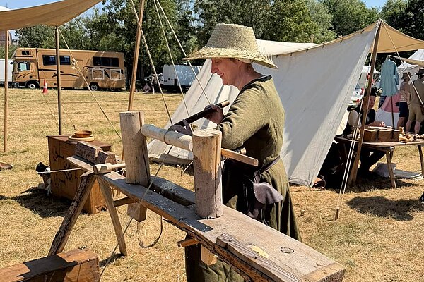 Lady whittling 
