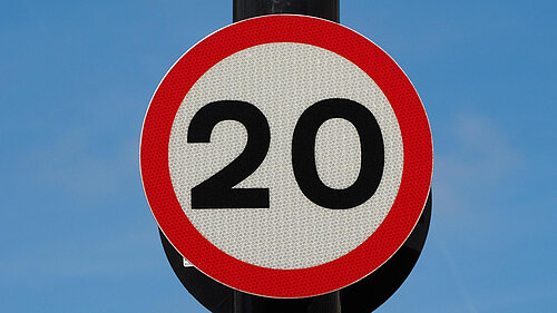 Twenty miles per hour speed sign.