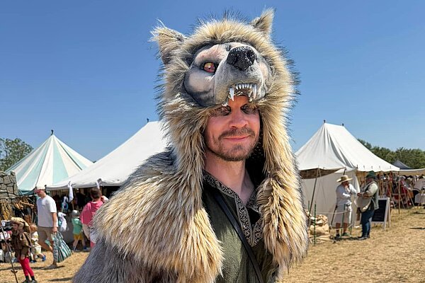 Man with wolf hat